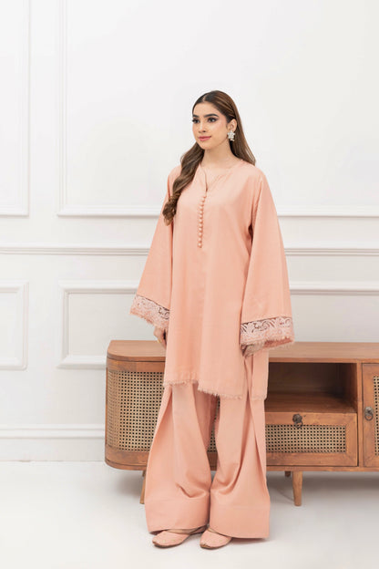 Powder pink karandi 2 piece ready-to-wear women’s suit displayed on a clean white background.