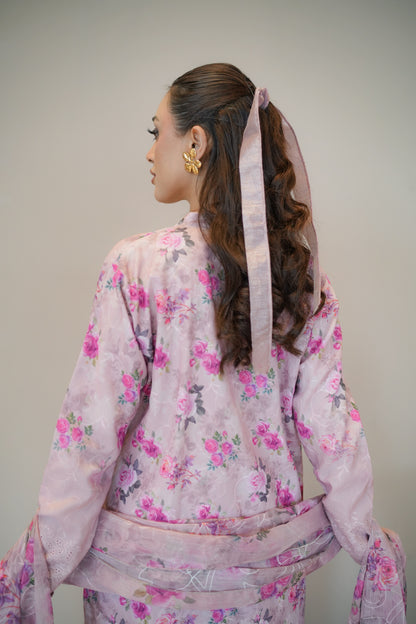 Woman wearing a pink floral outfit with a matching dupatta backview - Meryl Wear
