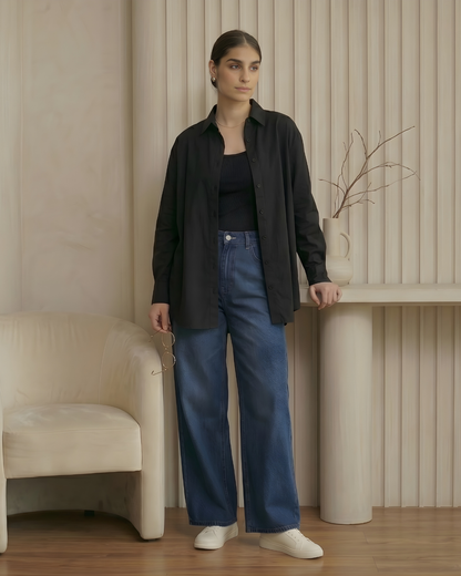 Women wearing a black button down shirt by Meryl Wear